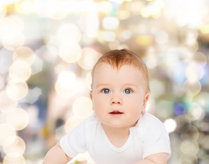 smiling baby looking up