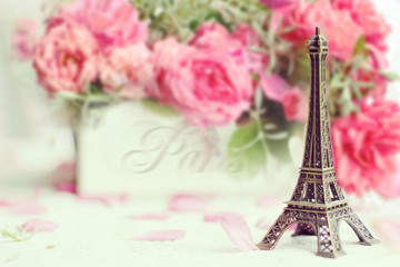 Fototapeta na wymiar Paris - Eiffel Tower and roses in retro style