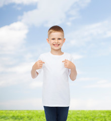smiling little boy in white blank t-shirt