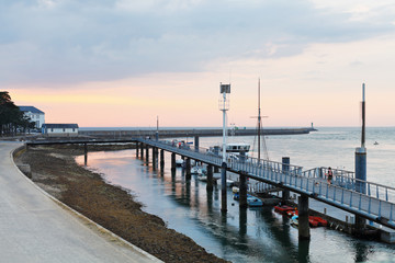 sundown over urban port in Le Croisic town, France
