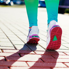 Fototapeta na wymiar Runner Feet Running on road Closeup in shoe