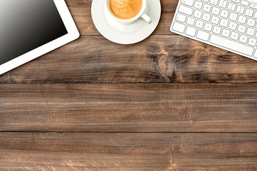digital tablet pc, keyboard and cup of coffee