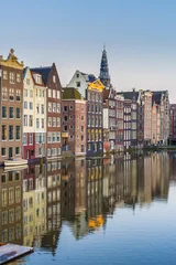 Plexiglas foto achterwand Het Damrak-kanaal in Amsterdam, Nederland. © Anibal Trejo