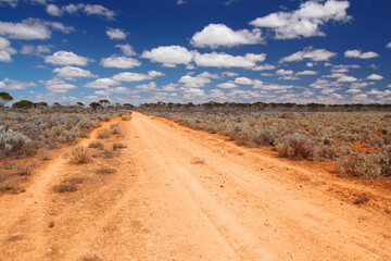 A lonely track in Australian outback on the Nullarbor Plain