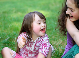 Happy girls have fun in the park.