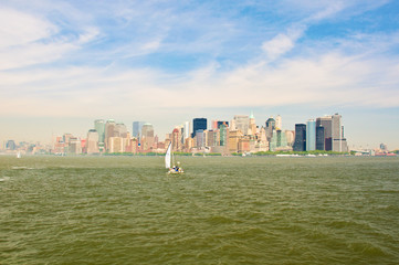 Sail yacht in foreground of Manhattan