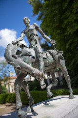 Fototapeta premium Four horsemen of the Apocalypse statue during the summer, Bruges