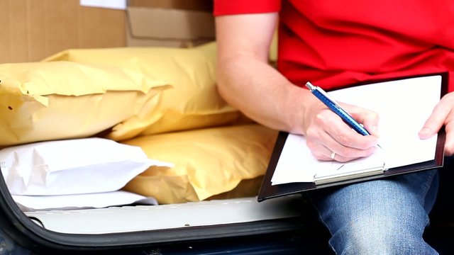 Courier writing waybill movie