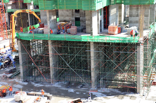 People working on Building Business Construction Site at Bangkok