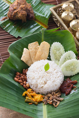 nasi lemak, a traditional malay curry paste rice dish served on