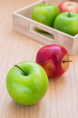 Green apple and red apple