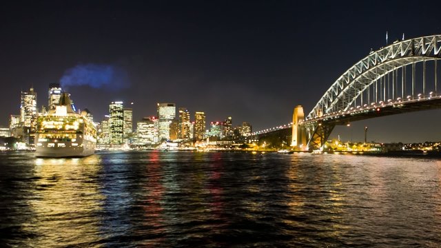 Sydney Touristic Harbor by Night (time lapse zoom out shot)