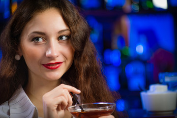 young woman in a bar
