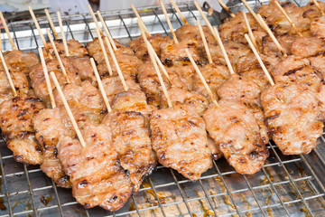 pork skewers place on a plate