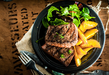 Grilled beef steak with roasted pumpkin