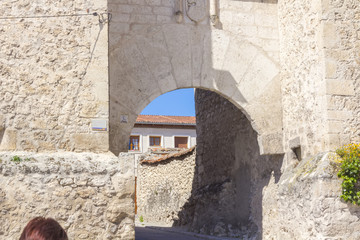 Old stone wall and entrance to the Mudejar era, the village of C
