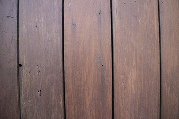 Naklejka premium Red brown wooden plank background