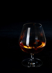 Glowing cognac or brandy in a snifter