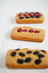 Sponge cake with wild berries on top