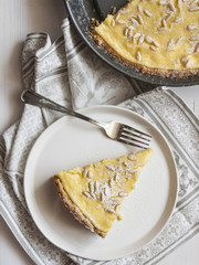 Cake with cream and pine nuts