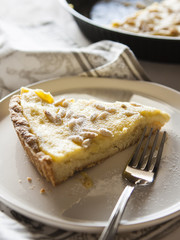 Cake with cream and pine nuts