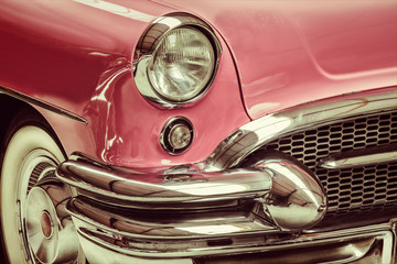 Retro styled image of a front of a classic car