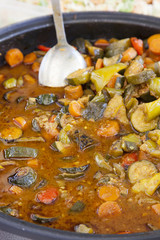Stir Traditional stew,  farm-style