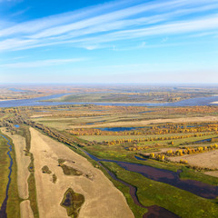 Top view of the countryside next to the river flood-land