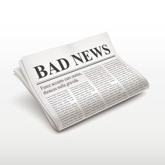 bad news words on newspaper