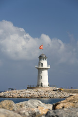 Fototapeta na wymiar Lighthouse in the port of Alanya, Turkey.