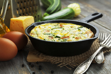 Baked zucchini with chicken and herbs