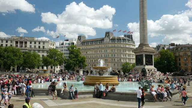 Trafalgar Square tourists, London, England.