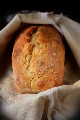 Fresh homemade  bread on a wooden table