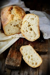 Fresh homemade  bread on a wooden table