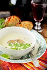 Potato cream soup with champignons