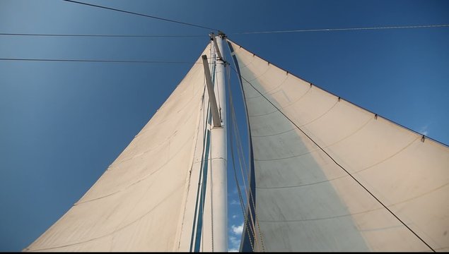 Sail of a sailing boat against sky