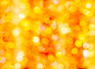Obraz premium Świąteczny bokeh pomarańczowy i żółty