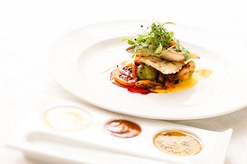 fish with vegetables and sauce