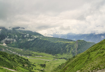 Fototapeta na wymiar Arial view to green Allpine valley