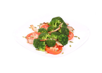 Broccoli salad with ham and pumpkin seeds.