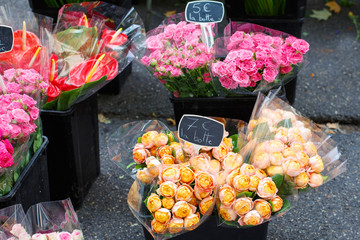 Bouquet of roses sold in the market in Provence, France.