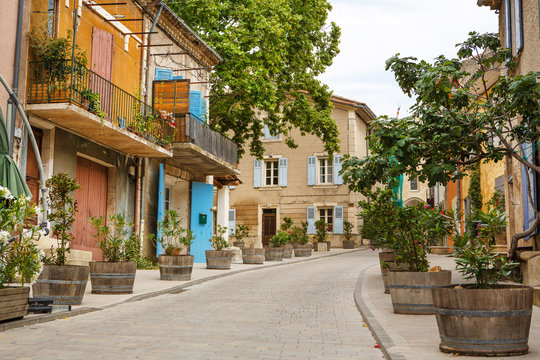 Fototapeta Provencal street with typical houses in southern France, Provenc