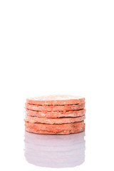 Frozen raw hamburger beef meat over white background