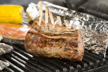 cooking ribs on the grill in the restaurant