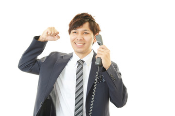 ガッツポーズのビジネスマン