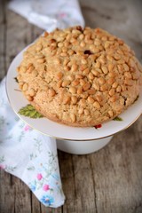 Pine nut cake on wooden table