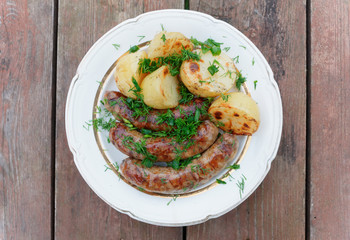 Grilled sausages and potatoes