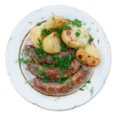 Grilled sausages and potatoes isolated on white