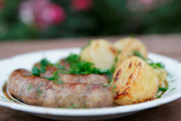 Grilled sausages and potatoes