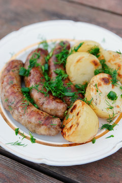 Grilled sausages and potatoes